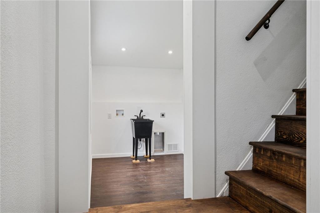 124 Oak Street Yukon, PA 15698 - Photo 19 of 35 a view of a livingroom with furniture and staircase