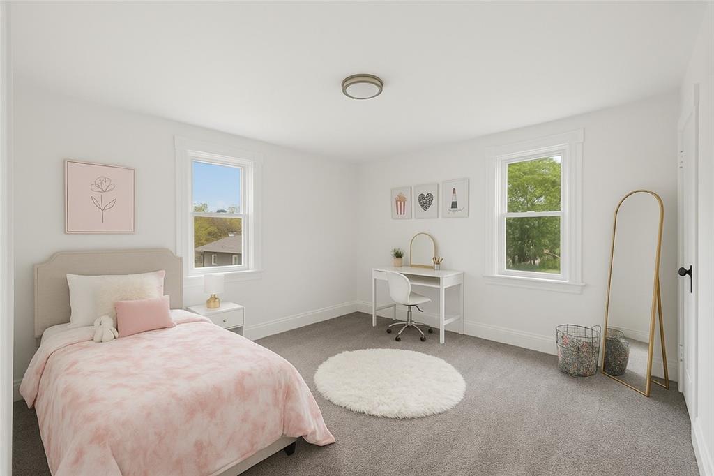 124 Oak Street Yukon, PA 15698 - Photo 21 of 35 a bedroom with a bed and a window