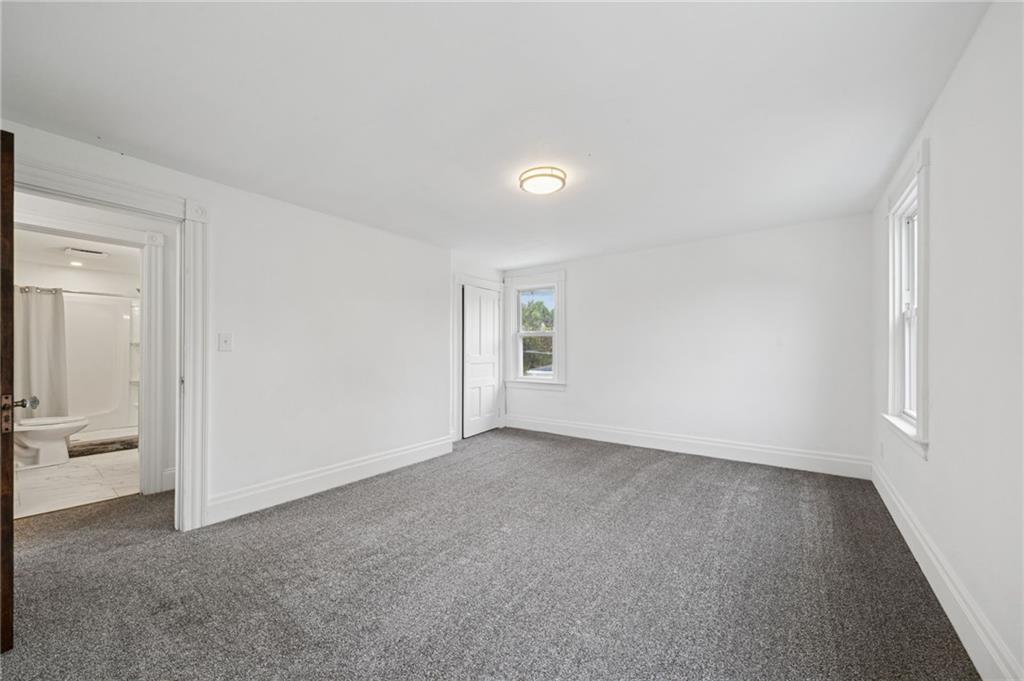 124 Oak Street Yukon, PA 15698 - Photo 25 of 35 an empty room with a bathroom