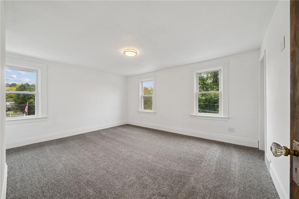 124 Oak Street Yukon, PA 15698 - Photo 27 of 35 an empty room with windows