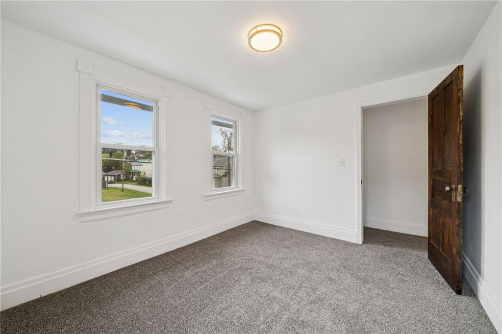 124 Oak Street Yukon, PA 15698 - Photo 28 of 35 an empty room with windows