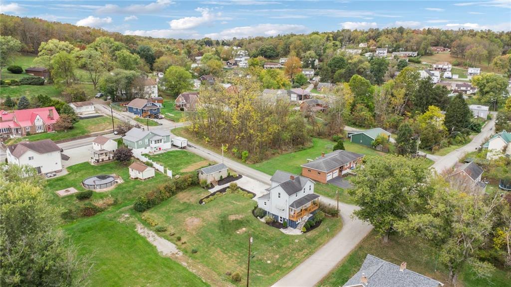 124 Oak Street Yukon, PA 15698 - Photo 32 of 35 an aerial view of residential houses with outdoor space