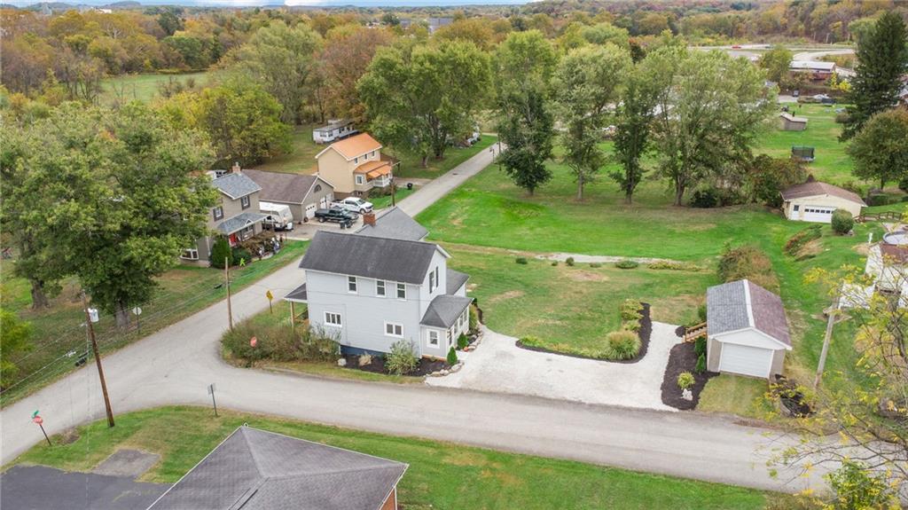 124 Oak Street Yukon, PA 15698 - Photo 35 of 35 an aerial view of a house with garden space and street view
