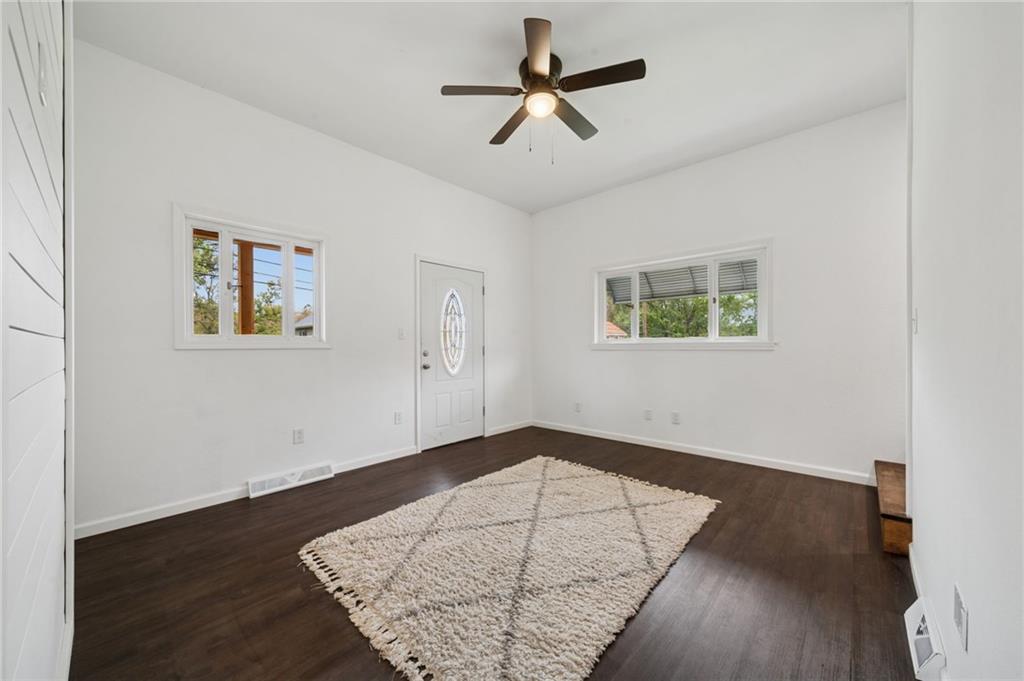 124 Oak Street Yukon, PA 15698 - Photo 5 of 35 a view of empty room with wooden floor