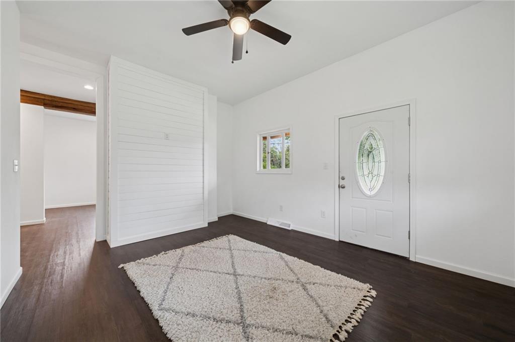 124 Oak Street Yukon, PA 15698 - Photo 6 of 35 a view of empty room with wooden floor