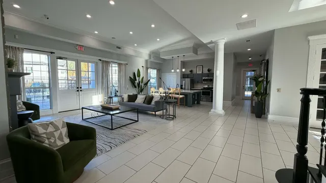 a view of a dining room with furniture window and outside view