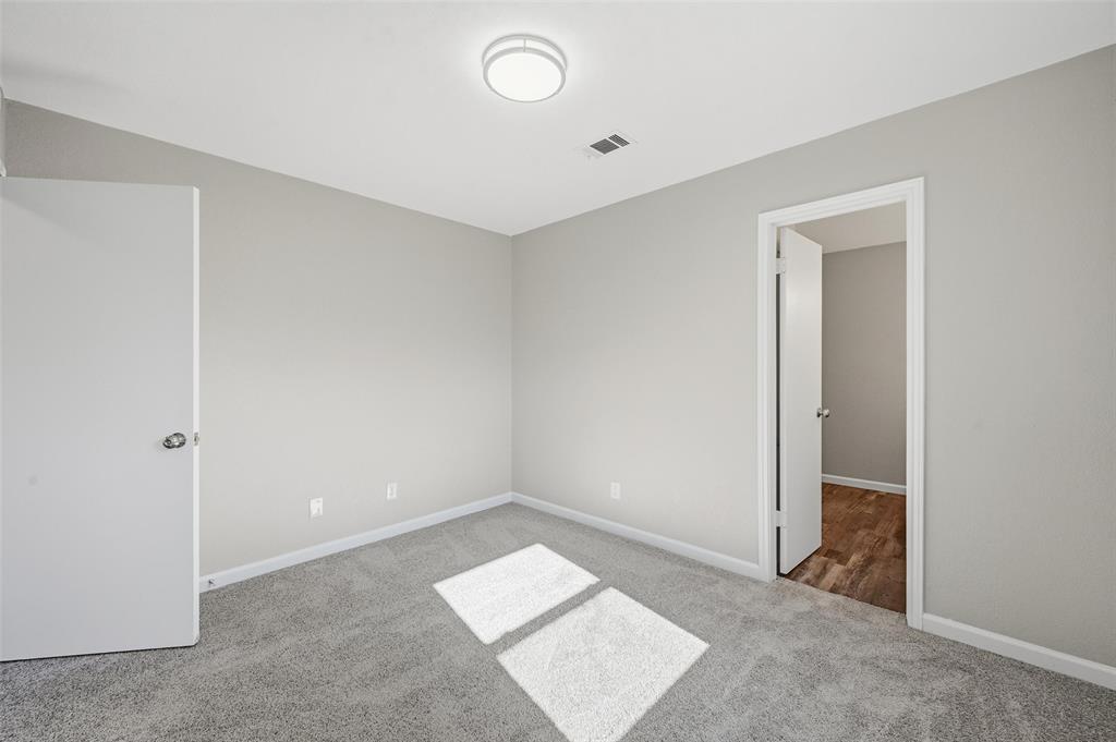 705 Timberoaks Drive Azle, TX 76020 - Photo 15 of 27 a view of an empty room