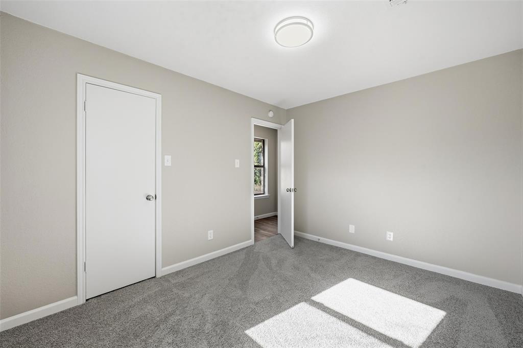 705 Timberoaks Drive Azle, TX 76020 - Photo 16 of 27 an empty room with an entryway