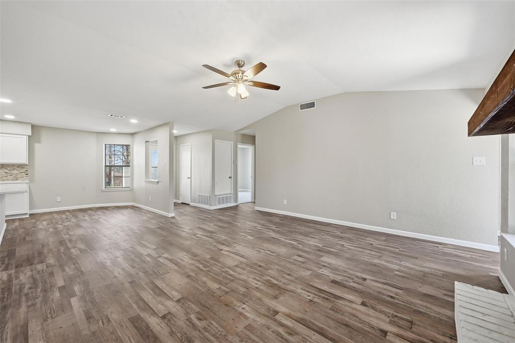 705 Timberoaks Drive Azle, TX 76020 - Photo 9 of 27 a view of an empty room with a window