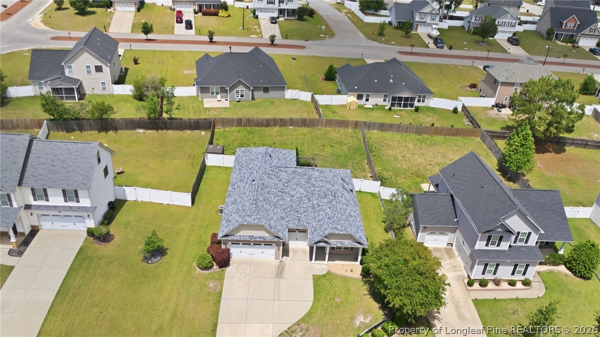 33 Colonist Place Cameron, NC 28326 - Photo 44 of 47 an aerial view of residential houses with outdoor space and swimming pool
