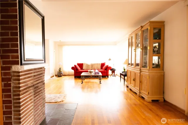 a view of a lobby with a lounge chair