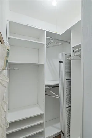 a bathroom with a shower and a stove