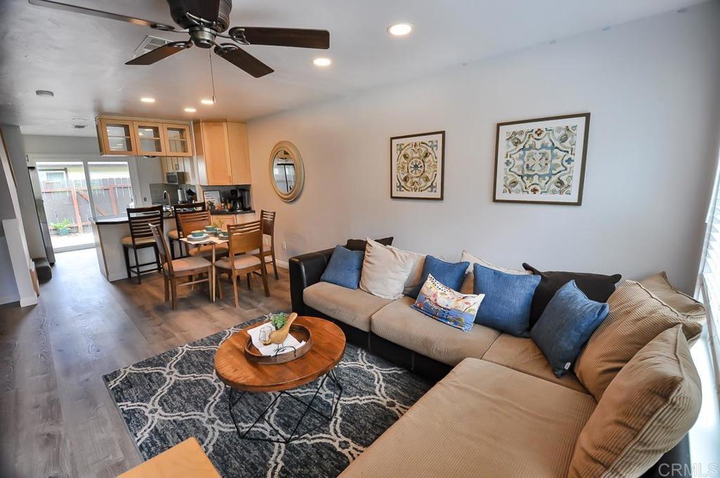 10155 Carefree Drive Santee, CA 92071 - Photo 2 of 19 a living room with furniture and a dining table