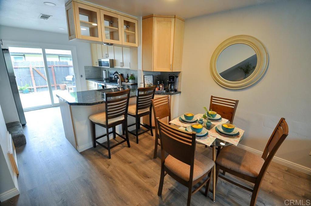 10155 Carefree Drive Santee, CA 92071 - Photo 4 of 19 a dining room with furniture and front door view