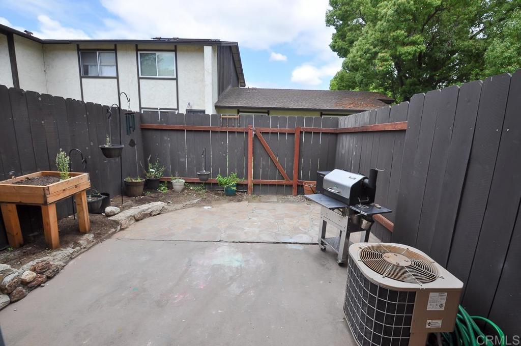 10155 Carefree Drive Santee, CA 92071 - Photo 10 of 19 a backyard of a house with table and chairs