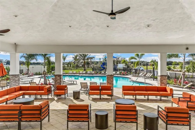 a room with furniture lots of tables and chairs