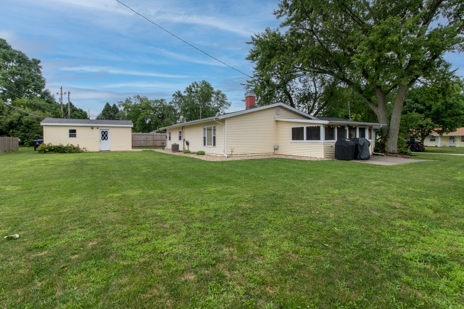222 Ivanhoe Way Bloomington, IL 61701 - Photo 41 of 46 a view of a house with a yard