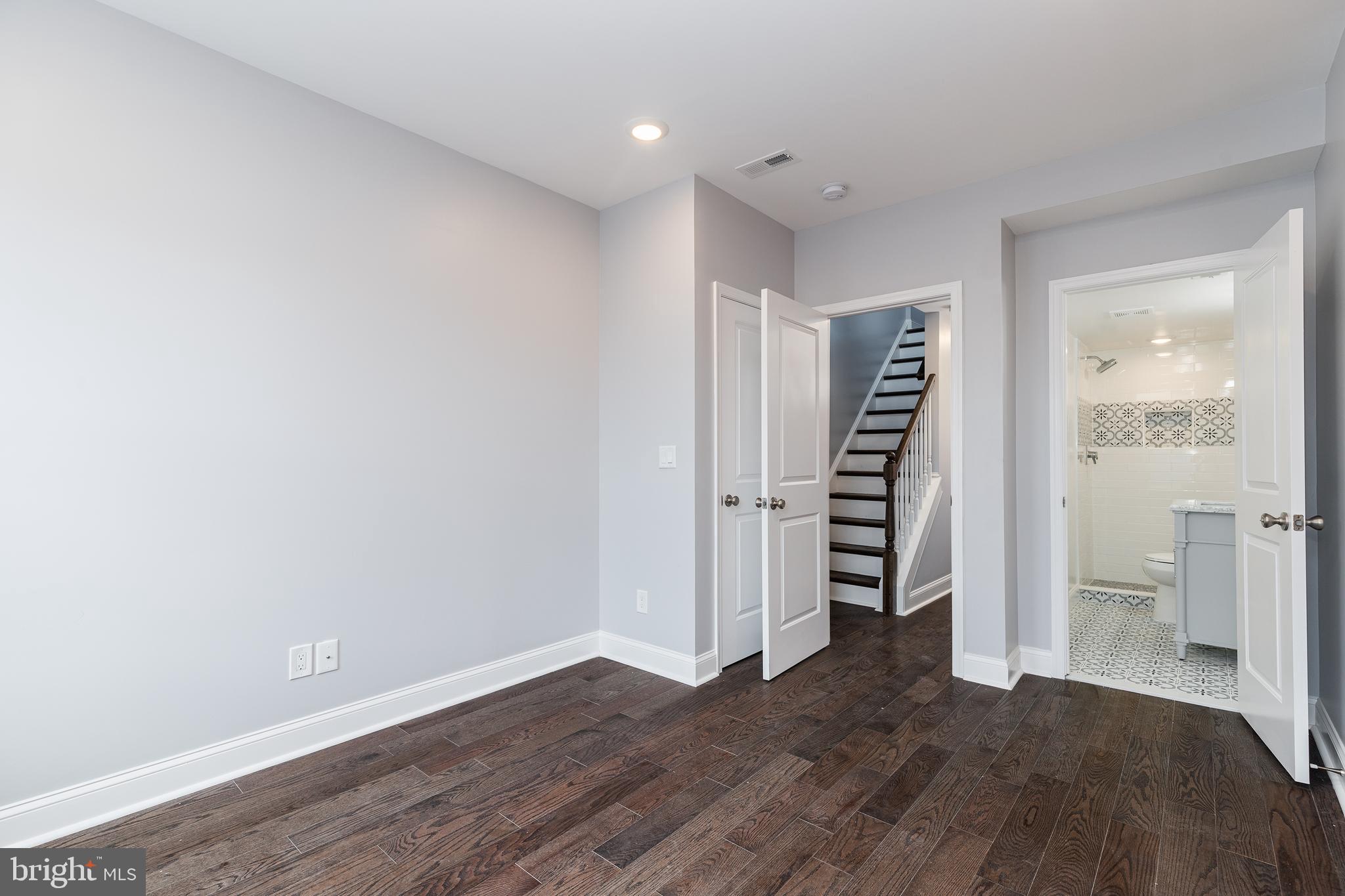 1701 Patapsco Street Baltimore, MD 21230 - Photo 17 of 52 a view of wooden floor and windows in a room