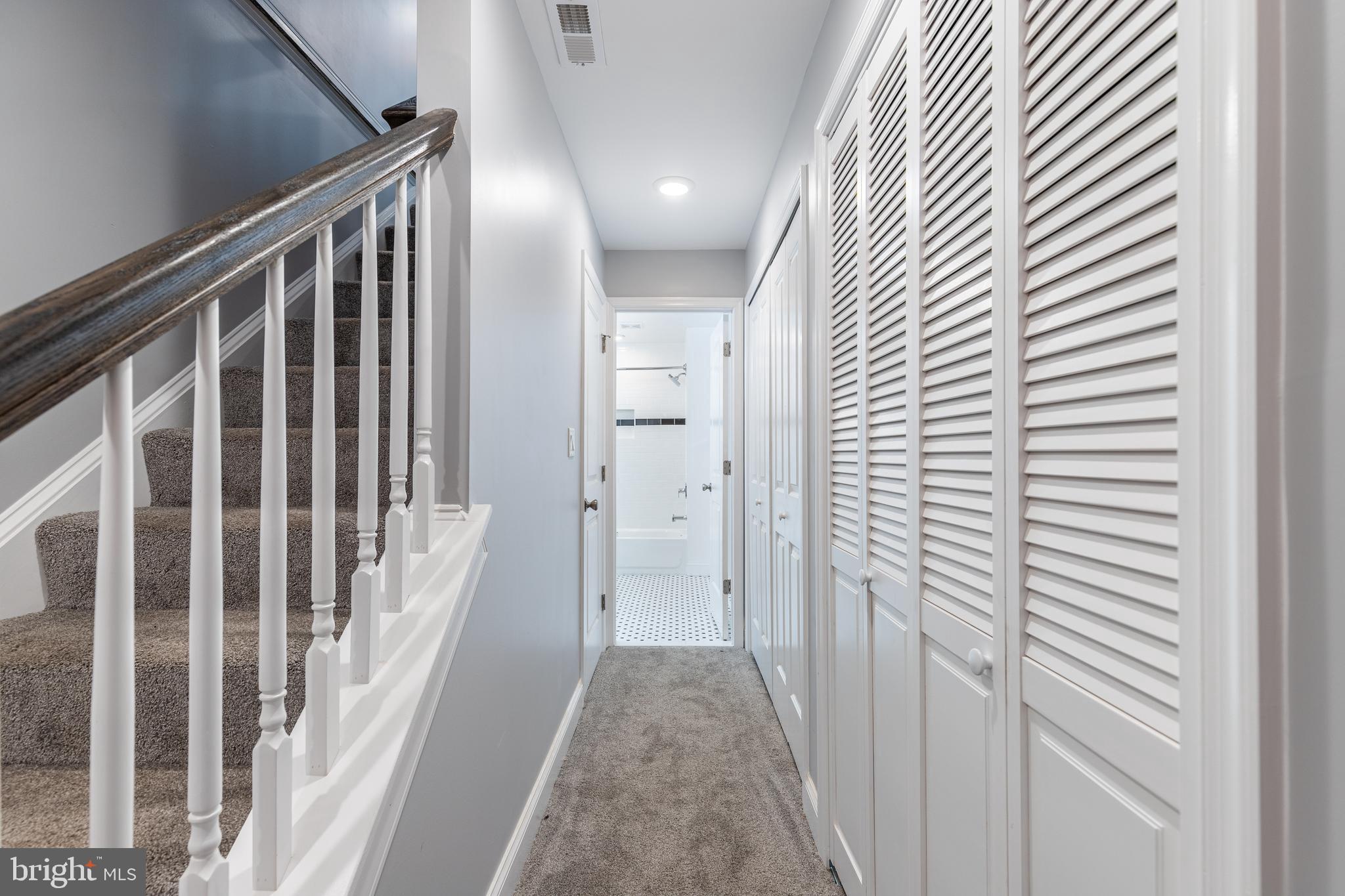 1701 Patapsco Street Baltimore, MD 21230 - Photo 37 of 52 a view of a hallway with wooden floor and staircase
