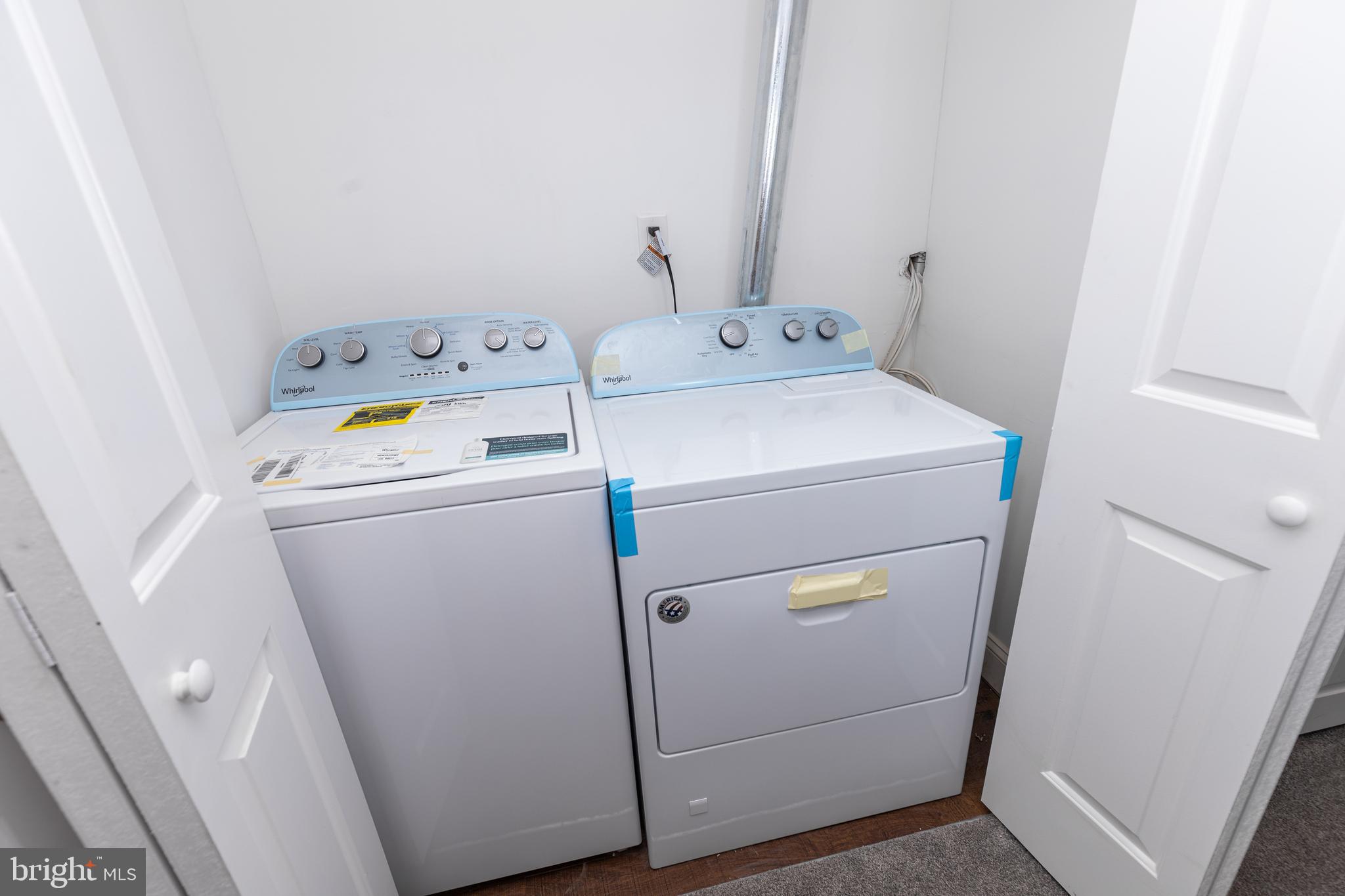 1701 Patapsco Street Baltimore, MD 21230 - Photo 41 of 52 a utility room with dryer and washer