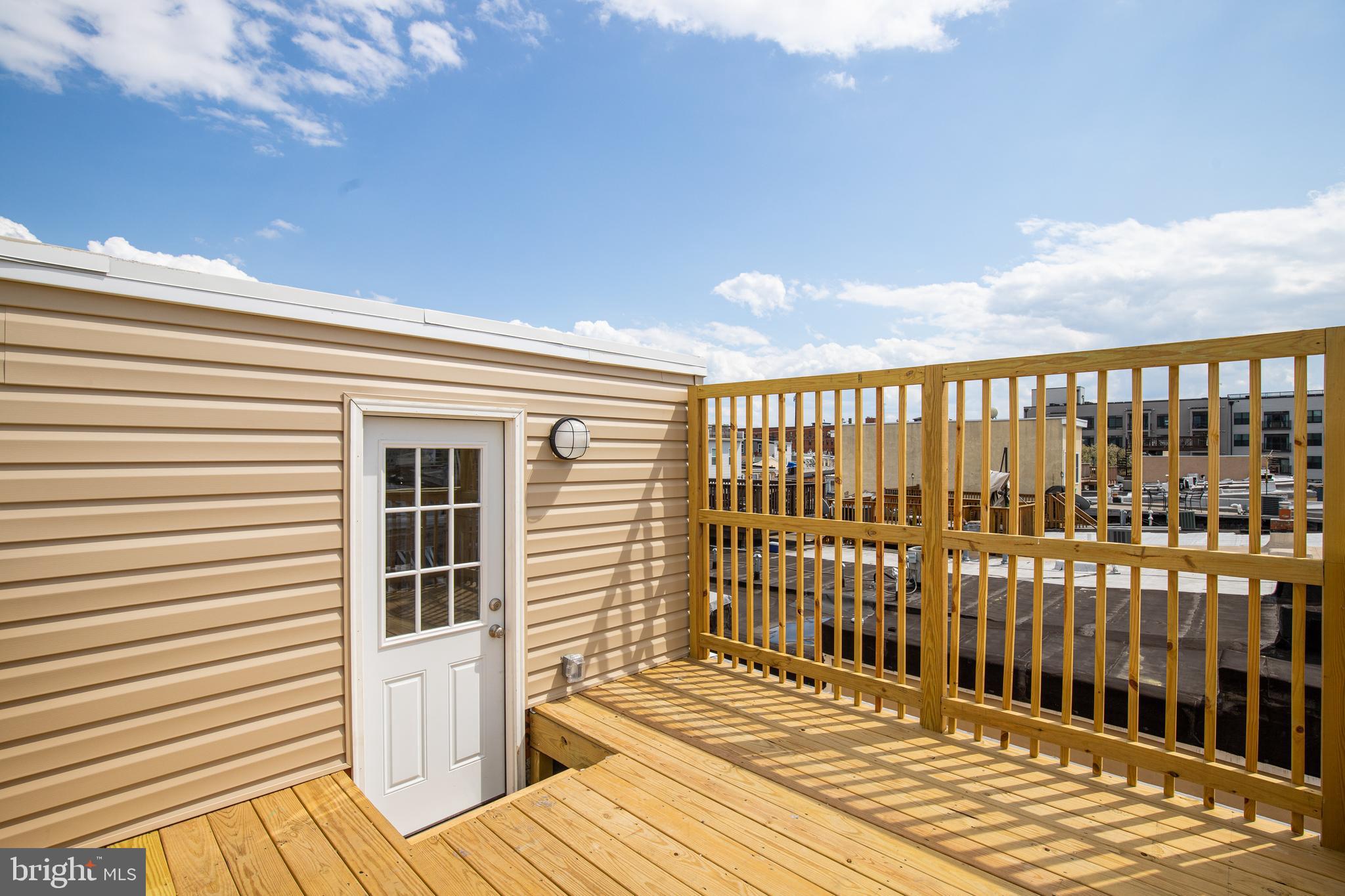 1701 Patapsco Street Baltimore, MD 21230 - Photo 44 of 52 a view of a balcony with a barbeque