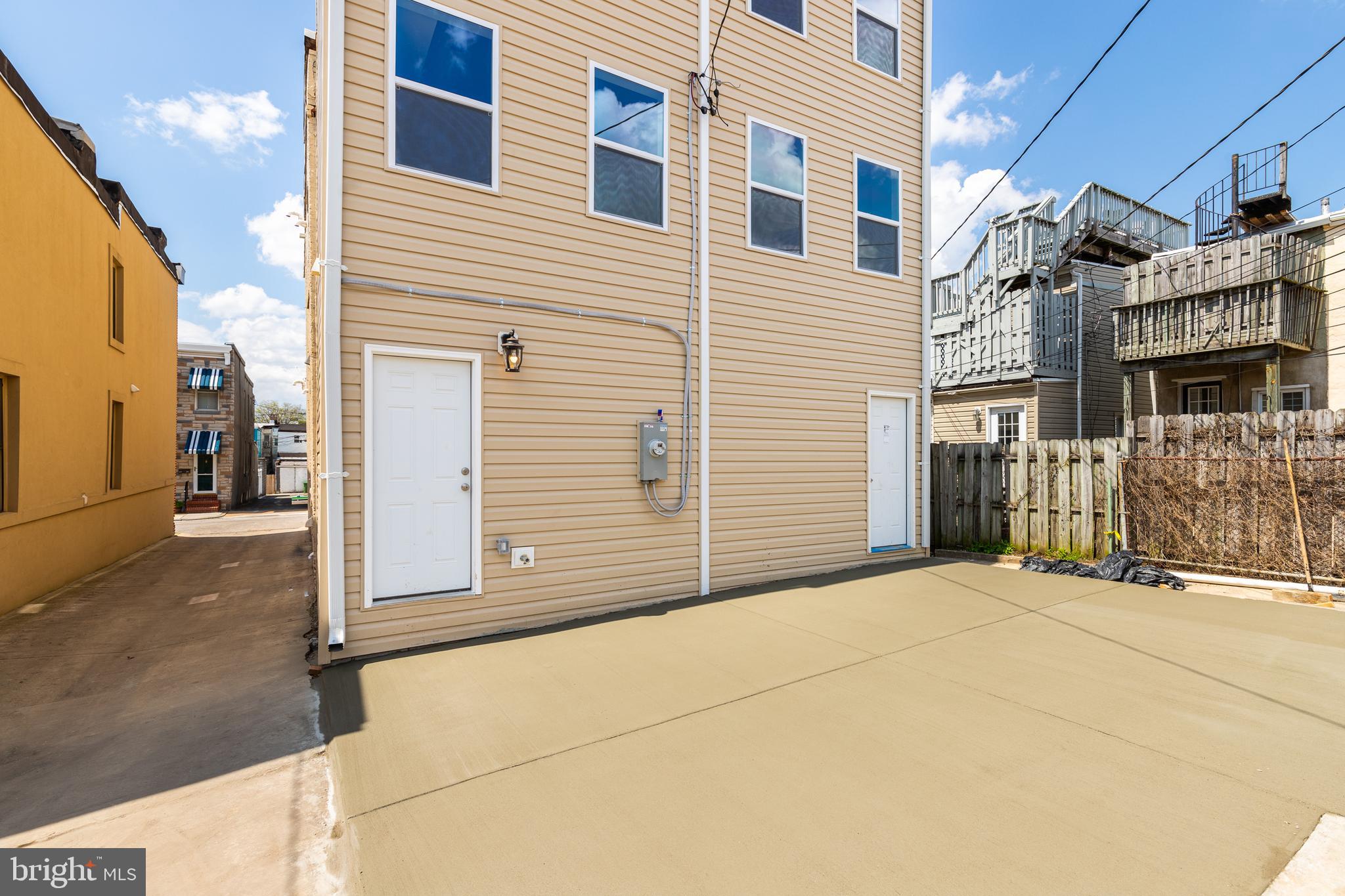 1701 Patapsco Street Baltimore, MD 21230 - Photo 49 of 52 a view of a house with a garage