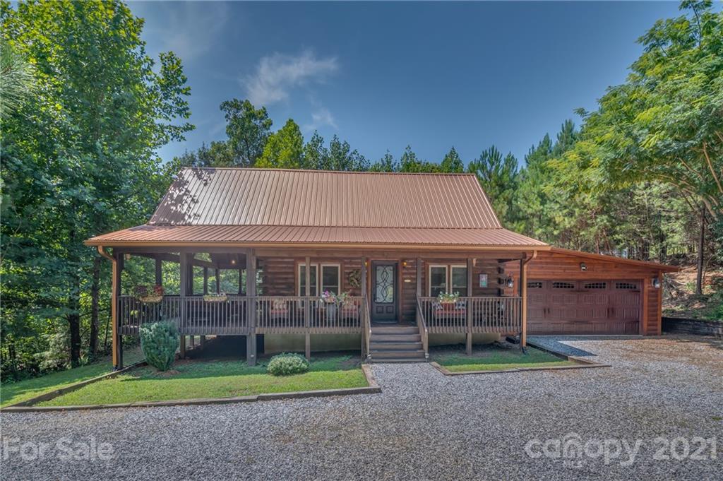 968 Cross Ridge Drive Rutherfordton, NC 28139 - Photo 1 of 39 a view of a house with a yard and plants
