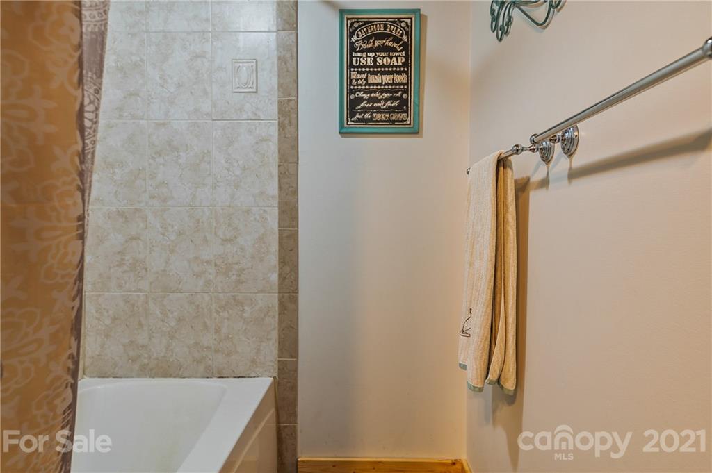 968 Cross Ridge Drive Rutherfordton, NC 28139 - Photo 11 of 39 a bathroom with a shower and a sink