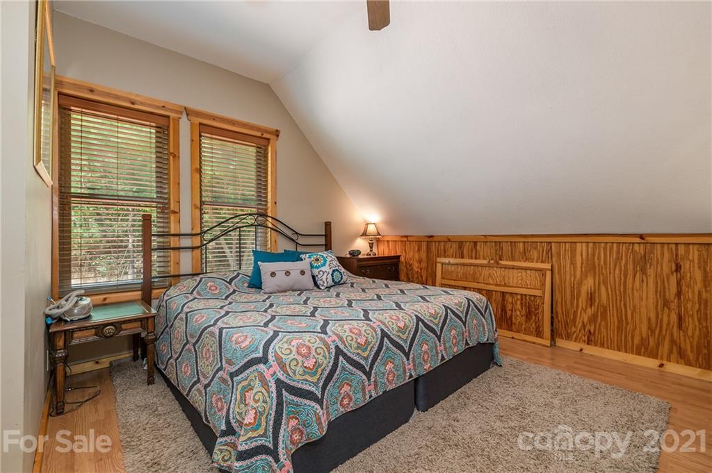 968 Cross Ridge Drive Rutherfordton, NC 28139 - Photo 14 of 39 a bedroom with a bed and a night stand