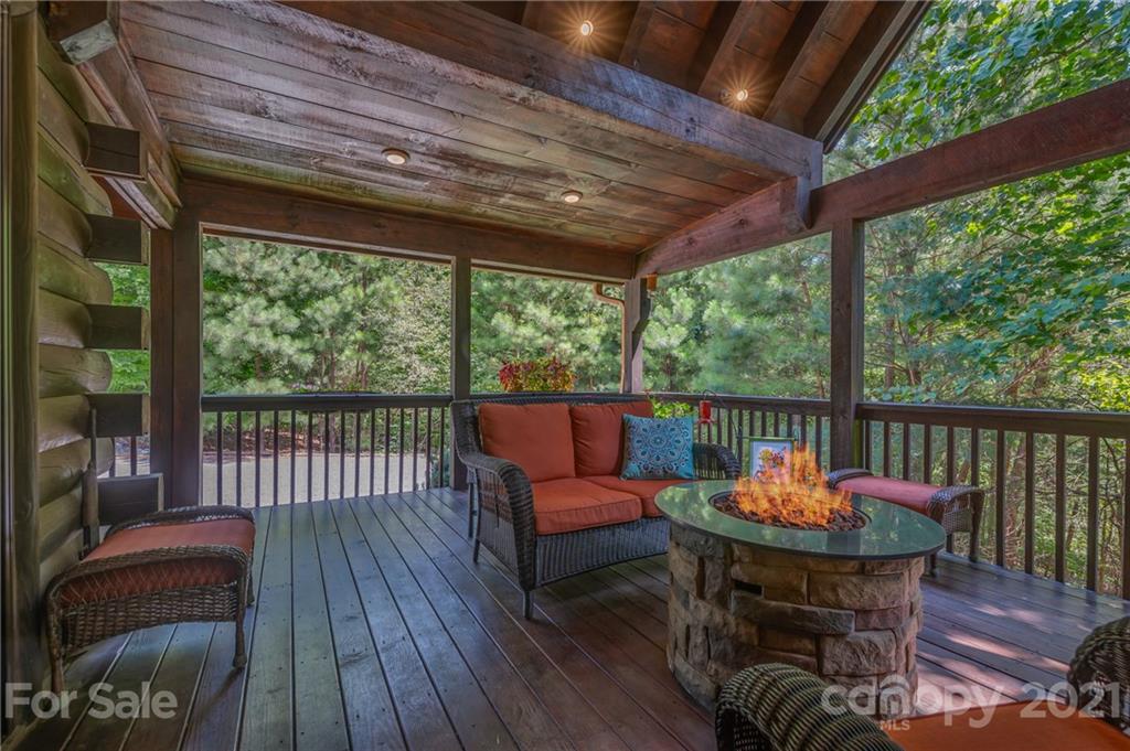 968 Cross Ridge Drive Rutherfordton, NC 28139 - Photo 27 of 39 a balcony with wooden floor outdoor seating and furniture