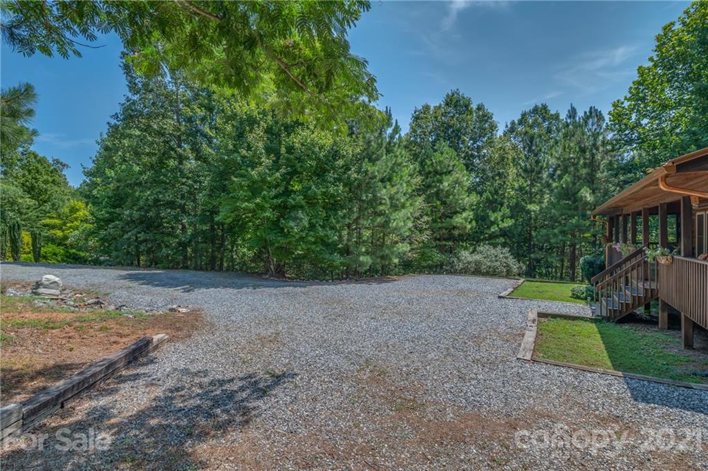 968 Cross Ridge Drive Rutherfordton, NC 28139 - Photo 34 of 39 a view of a house with a yard