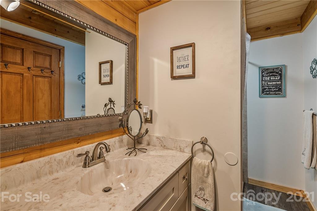 968 Cross Ridge Drive Rutherfordton, NC 28139 - Photo 10 of 39 a bathroom with a sink and a mirror