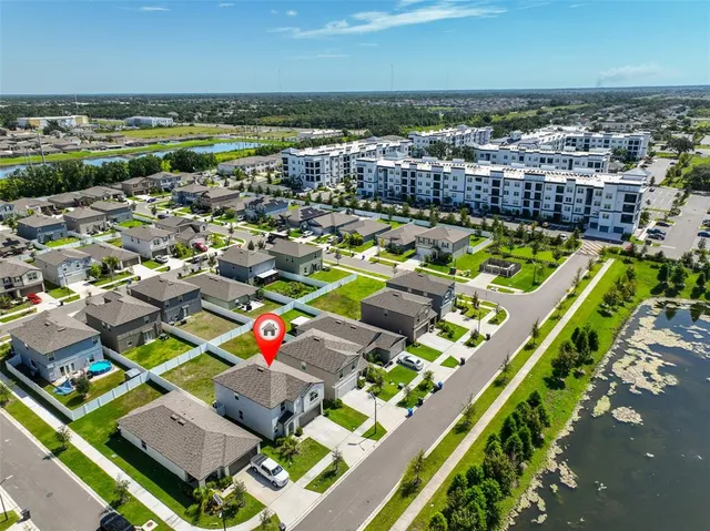 an aerial view of a tennis ground and a terrace