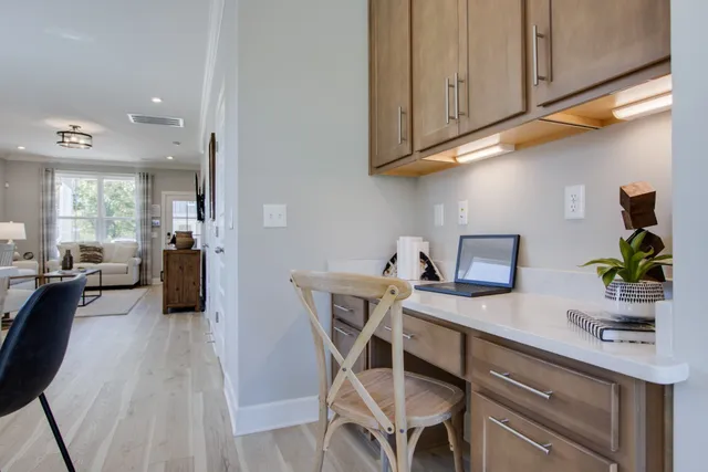 a kitchen with a table and chairs
