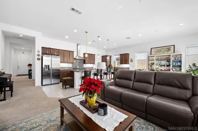 a view of a dining room with furniture and window