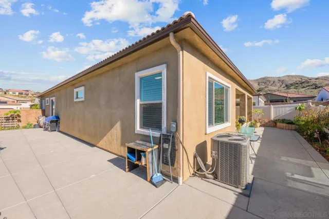 a view of a pathway with a flower plants