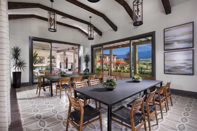 a view of swimming pool with outdoor seating and mountain view