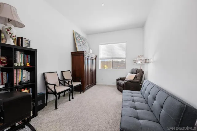 a utility room with dryer washer and other items