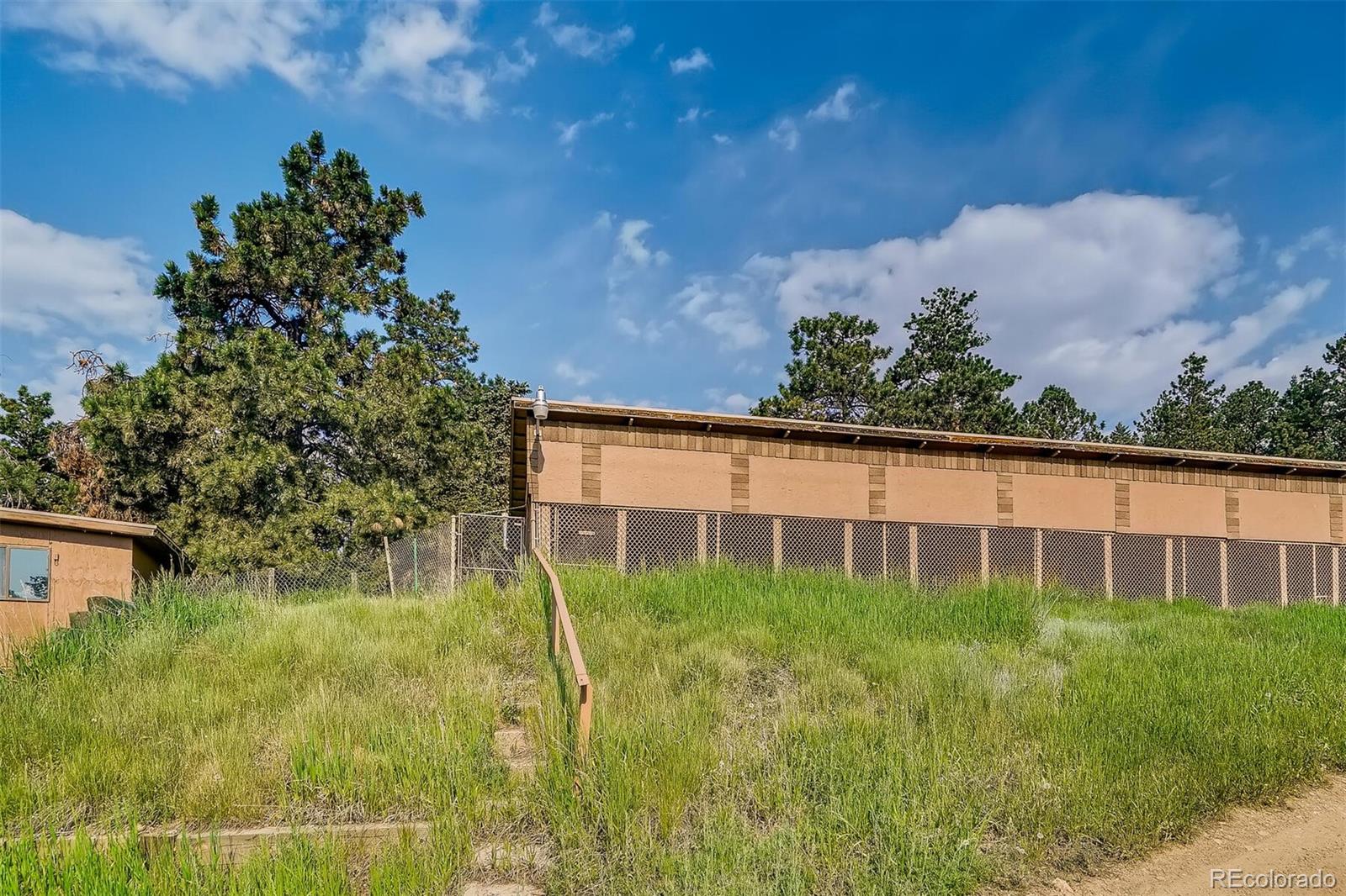 8939 South Hillview Road Morrison, CO 80465 - Photo 16 of 39 a view of a back yard
