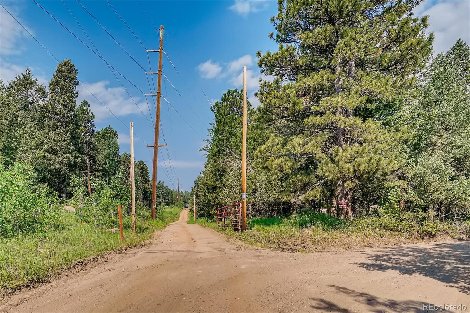 8939 South Hillview Road Morrison, CO 80465 - Photo 39 of 39 a flag is sitting next to a road