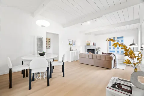 a living room with furniture and a couch