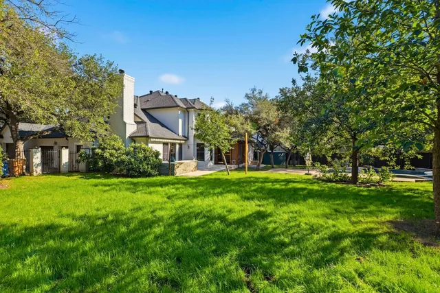 a view of a backyard with a garden