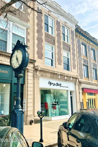 a view of a brick building with a outdoor space