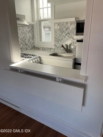 a close view of sink and mirror