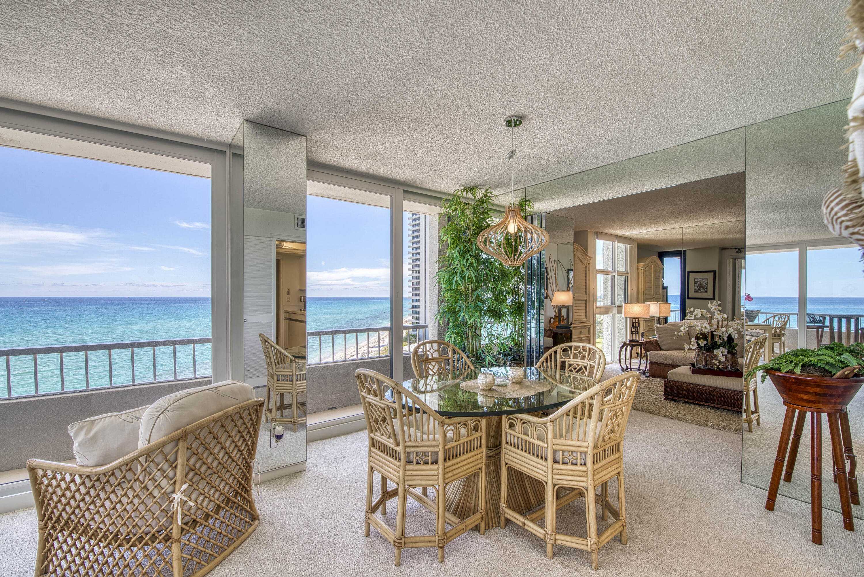 5540 North Ocean Drive, Unit 7A Singer Island, FL 33404 - Photo 12 of 26 a dining room with furniture and a large window