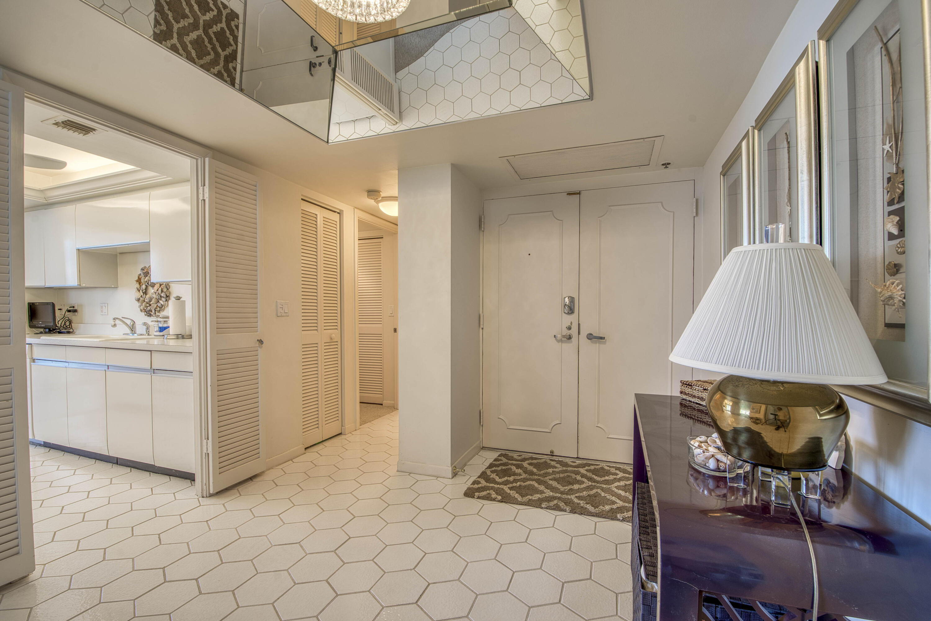 5540 North Ocean Drive, Unit 7A Singer Island, FL 33404 - Photo 24 of 26 a view of room with furniture and wooden floor