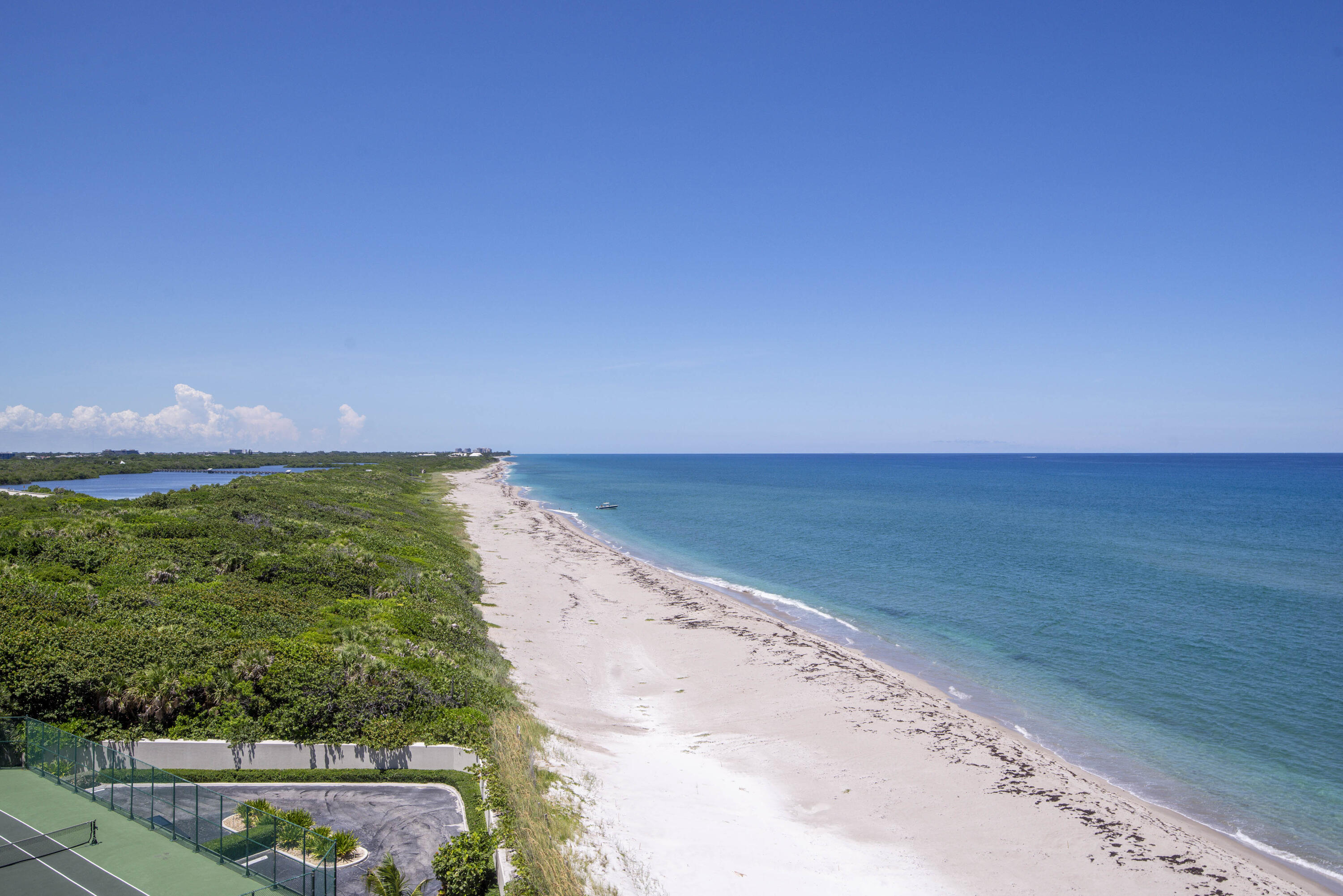 5540 North Ocean Drive, Unit 7A Singer Island, FL 33404 - Photo 26 of 26 a view of an ocean beach and mountain