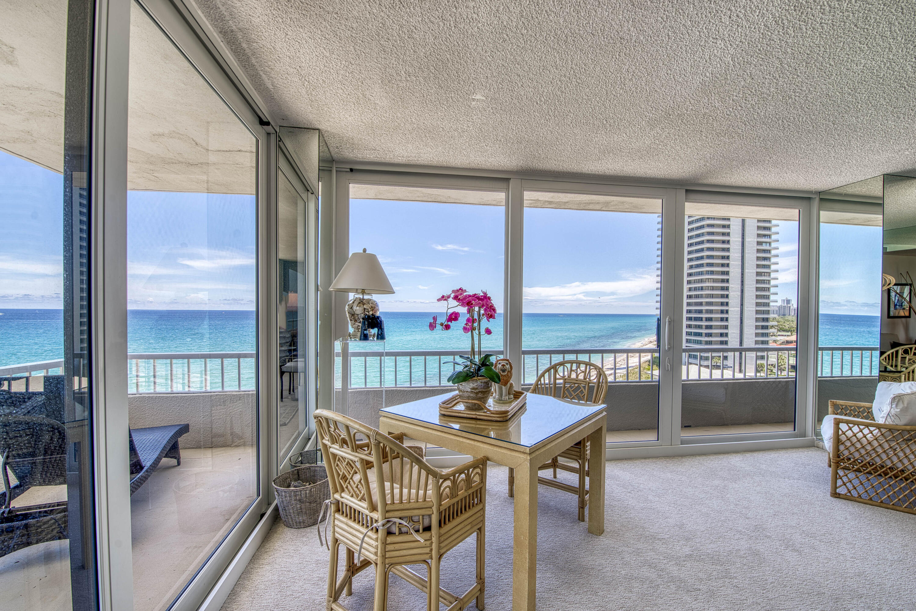 5540 North Ocean Drive, Unit 7A Singer Island, FL 33404 - Photo 9 of 26 a dining room with furniture and front door