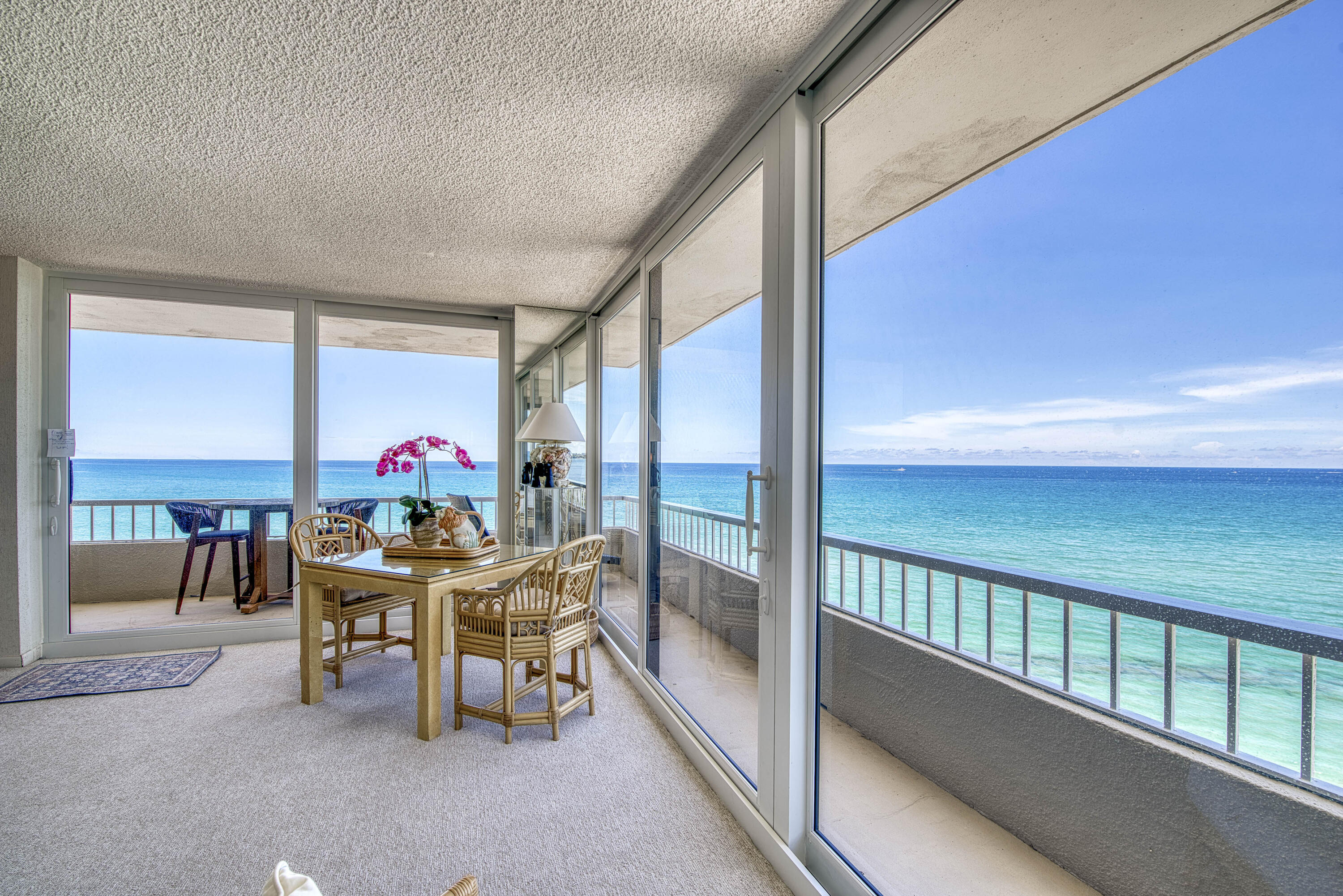 5540 North Ocean Drive, Unit 7A Singer Island, FL 33404 - Photo 10 of 26 a view of a dining room with furniture window and outside view
