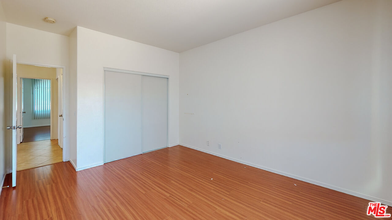 68606 La Medera Road Cathedral City, CA 92234 - Photo 22 of 33 a view of a room with wooden floor and bench